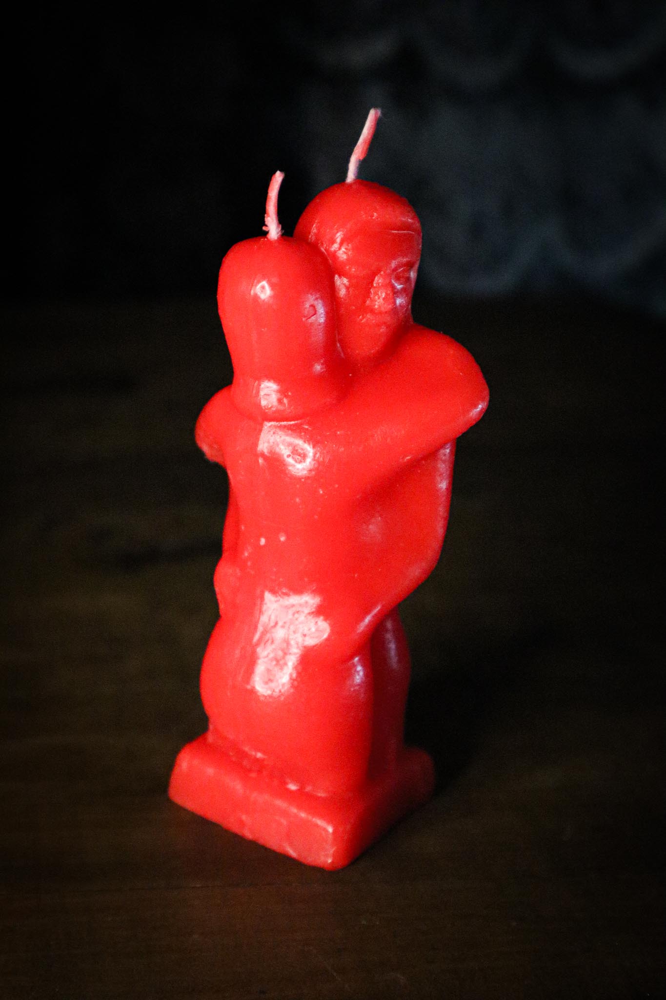 Embracing Couple Red Candle